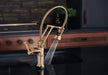 Brizo Artesso: SmartTouch Articulating Faucet With Finished Hose