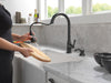 Delta Capertee 19877Z Single Handle Pull-Down Kitchen Faucet with Soap Dispenser and ShieldSpray Technology