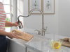 Delta Capertee 19877Z Single Handle Pull-Down Kitchen Faucet with Soap Dispenser and ShieldSpray Technology