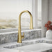 Kohler Tone Touchless pull-down kitchen sink faucet with three-function sprayhead