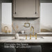 Kohler Billet Two-hole bridge kitchen sink faucet with side sprayer