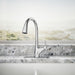 Kohler Rival Pull-down kitchen sink faucet with two-function sprayhead