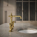 Kohler Artifacts Three-hole bridge bar sink faucet with side sprayer