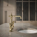 Kohler Artifacts Three-hole bridge bar sink faucet with side sprayer