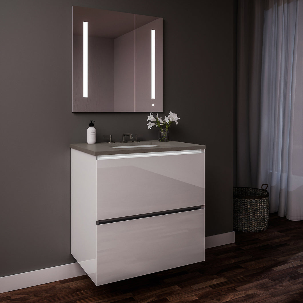Curated Cartesian 24" x 15" x 21" two drawer vanity in white glass with slow-close plumbing drawer, full drawer, night light and Engineered Stone 25" vanity top in stone gray (Silestone expo grey)